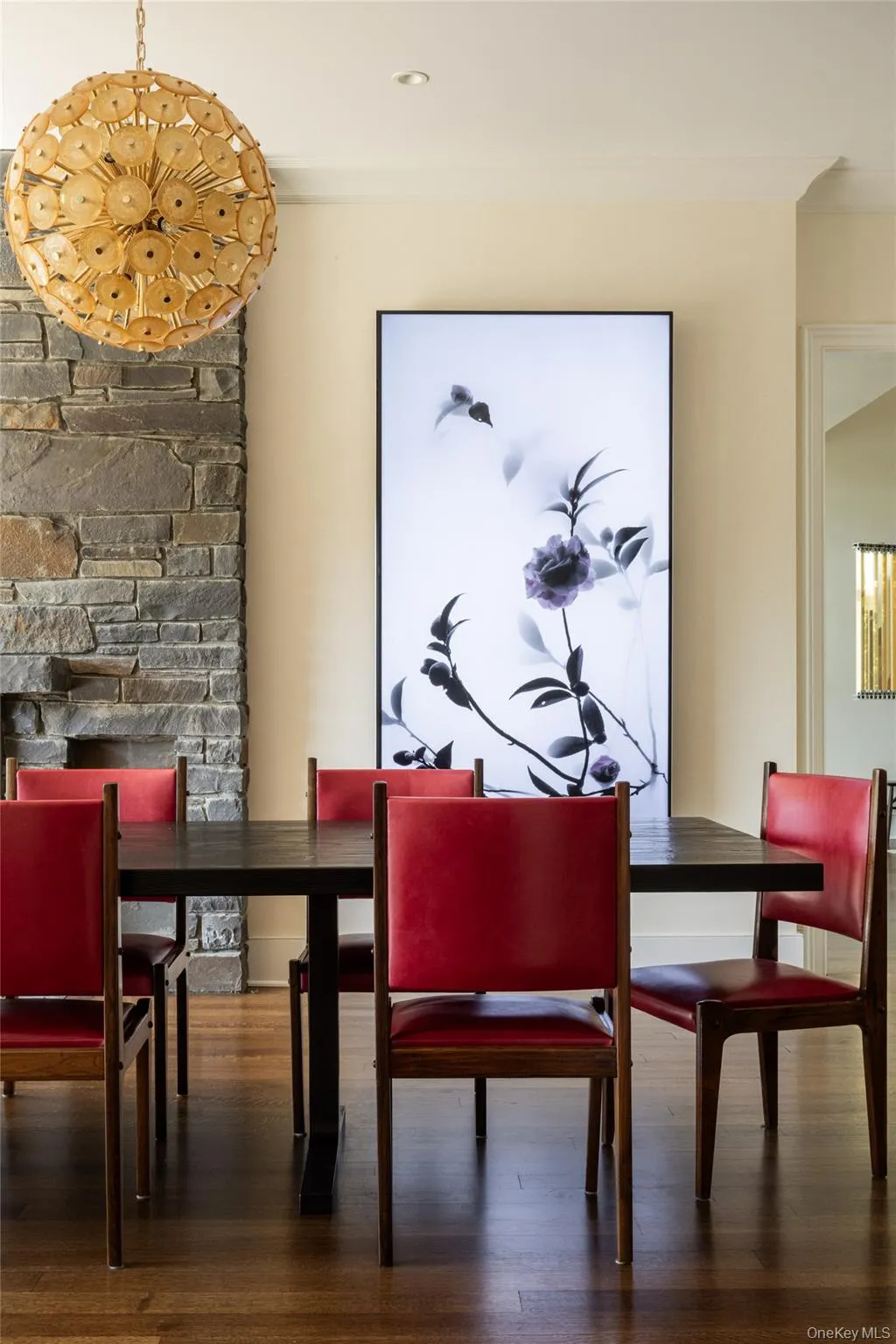 Dining space featuring dark wood-style floors Dining space featuring dark wood-style floors