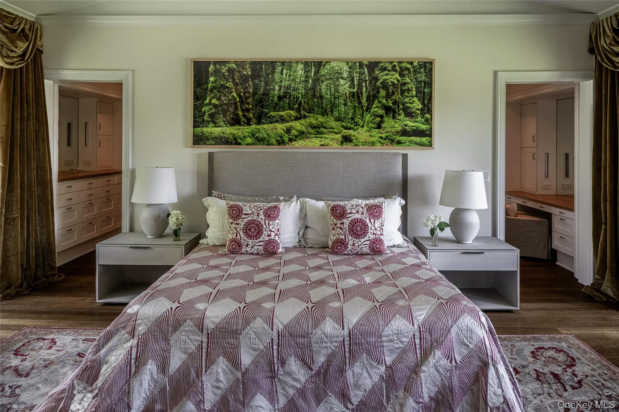 Bedroom featuring ensuite bathroom, dark wood finished floors, crown molding, and multiple windows Bedroom featuring ensuite bathroom, dark wood finished floors, crown molding, and multiple windows