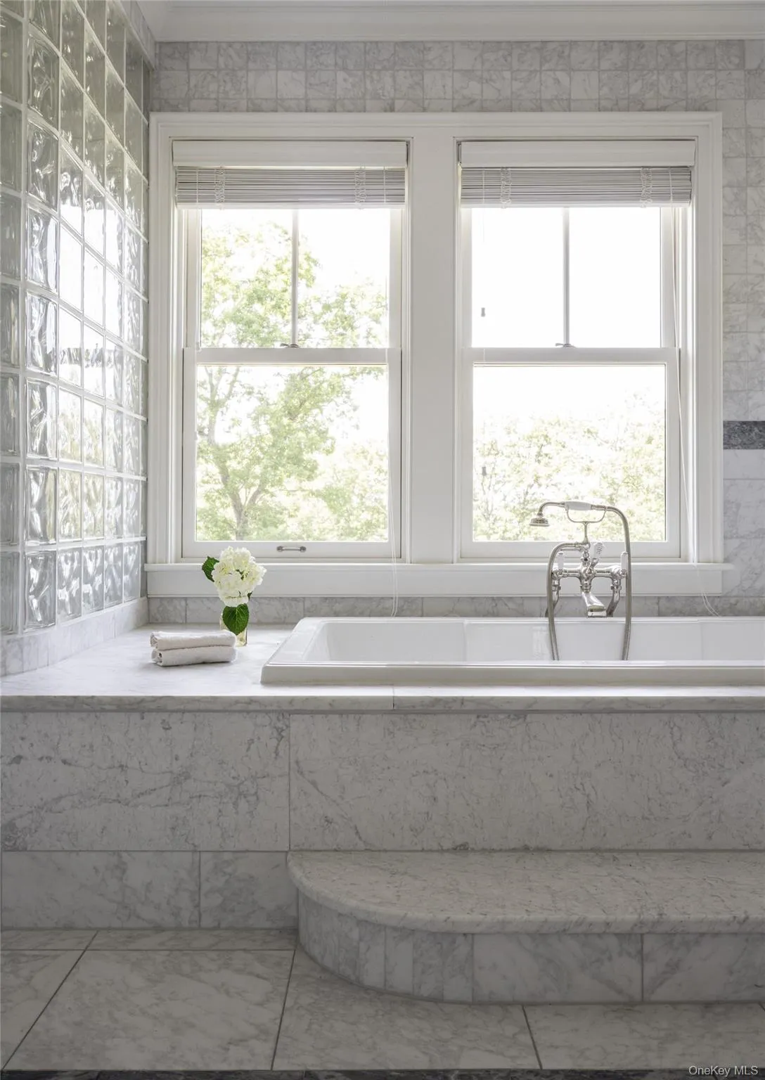 Full bath featuring a freestanding tub Full bath featuring a freestanding tub