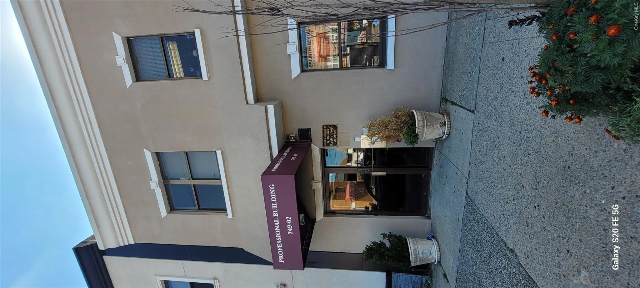 Entrance to property featuring stucco siding and french doors Entrance to property featuring stucco siding and french doors