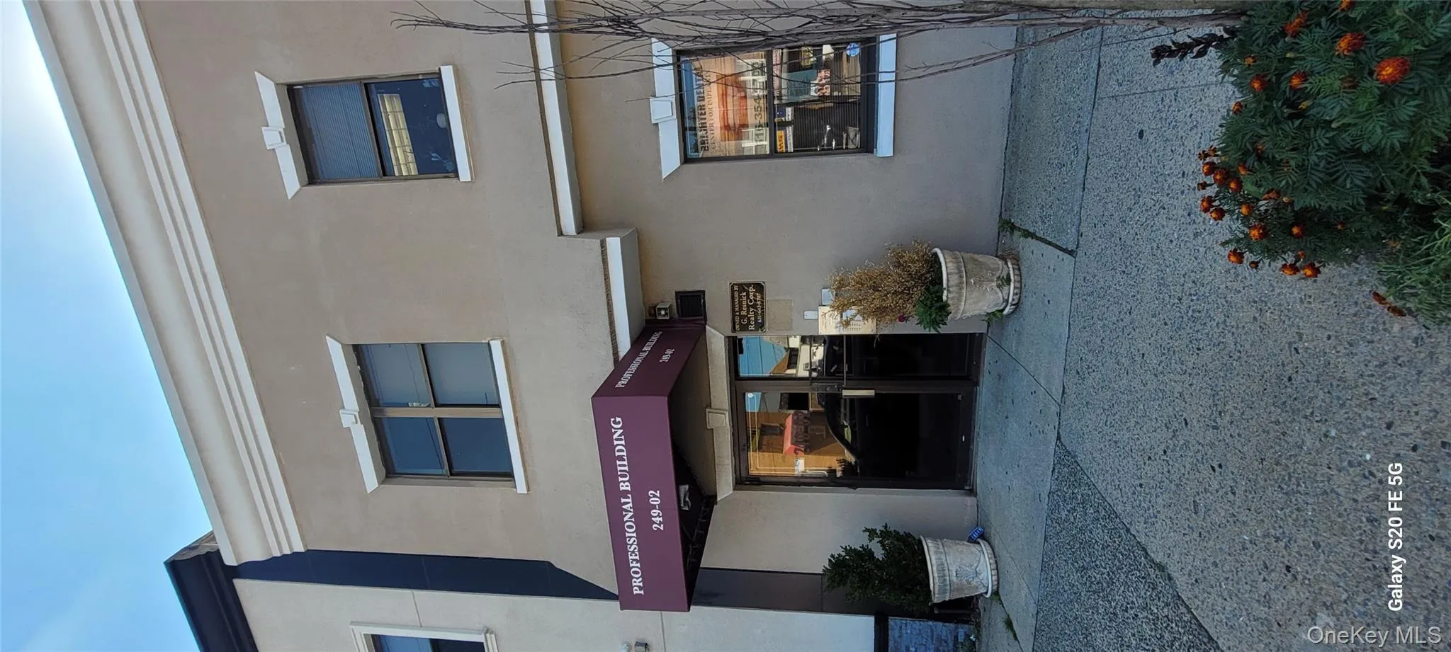 Entrance to property featuring stucco siding and french doors Entrance to property featuring stucco siding and french doors