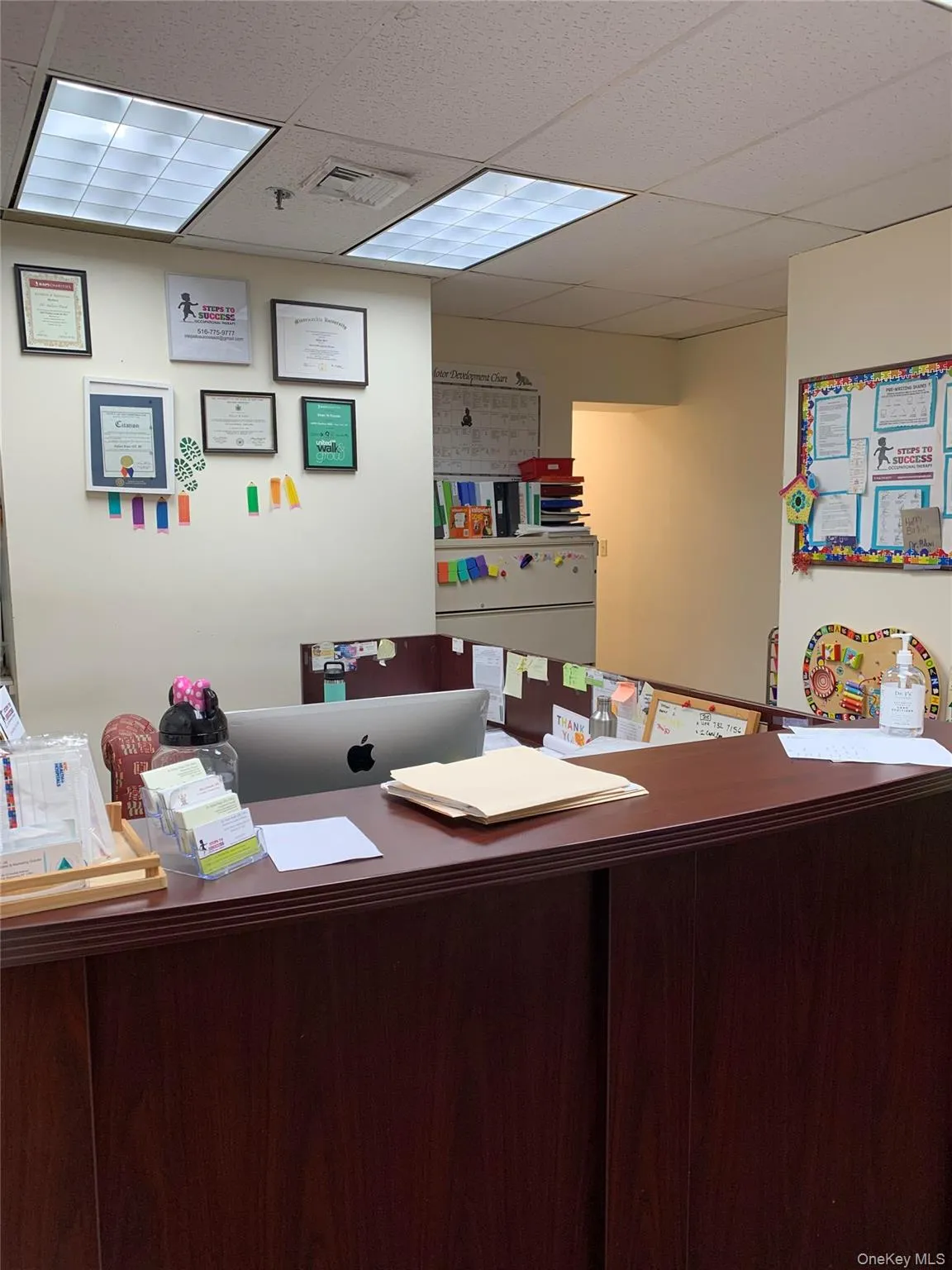 Office area featuring a paneled ceiling Office area featuring a paneled ceiling