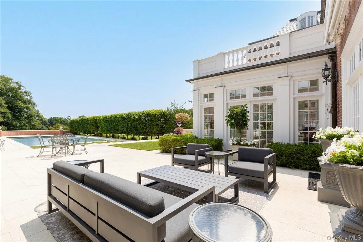 View of patio featuring an outdoor hangout area and an outdoor pool View of patio featuring an outdoor hangout area and an outdoor pool
