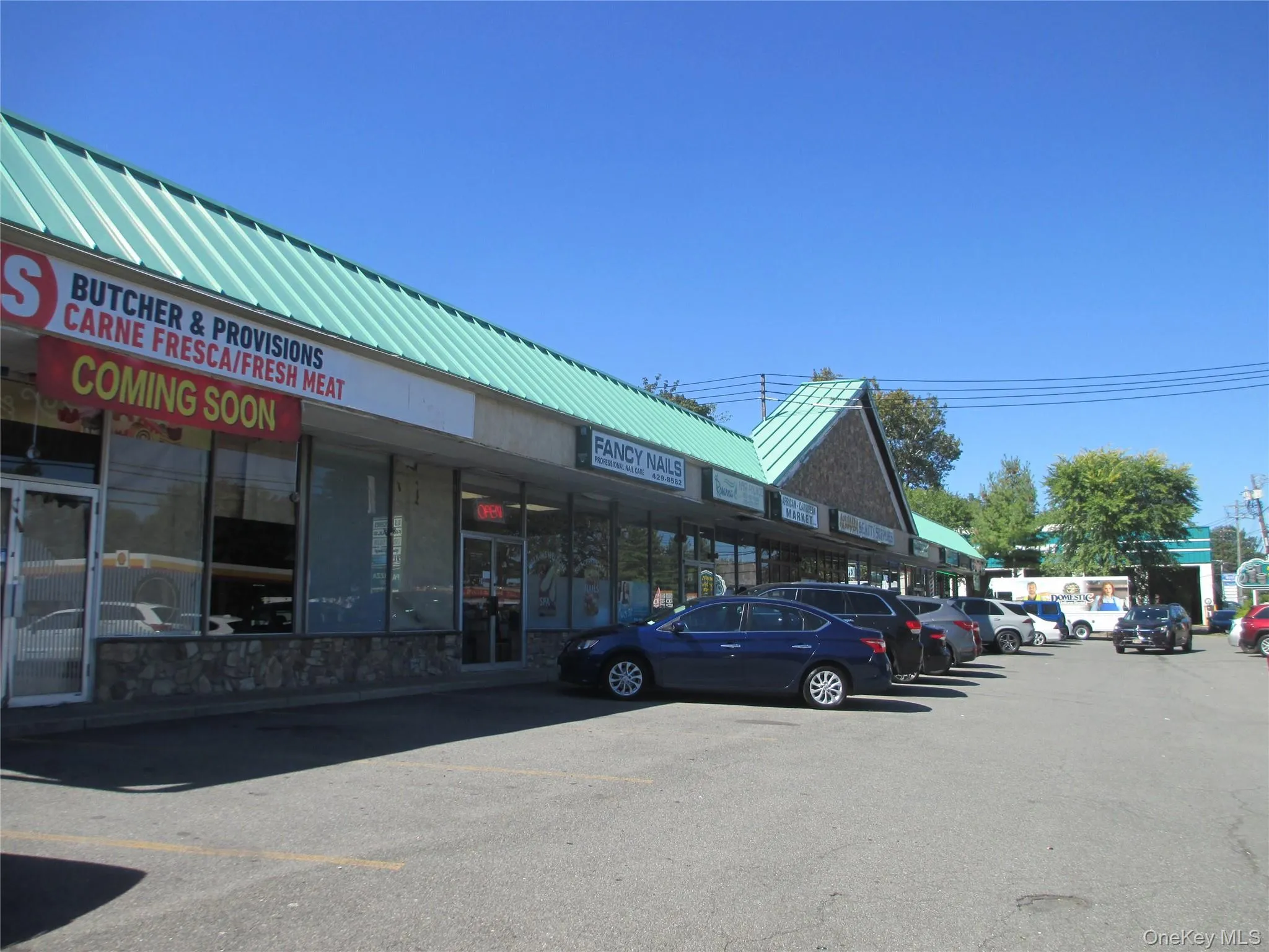 View of commercial location with uncovered parking View of commercial location with uncovered parking