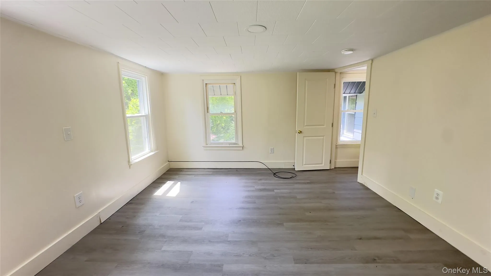 Empty room featuring vinyl flooring Empty room featuring vinyl flooring
