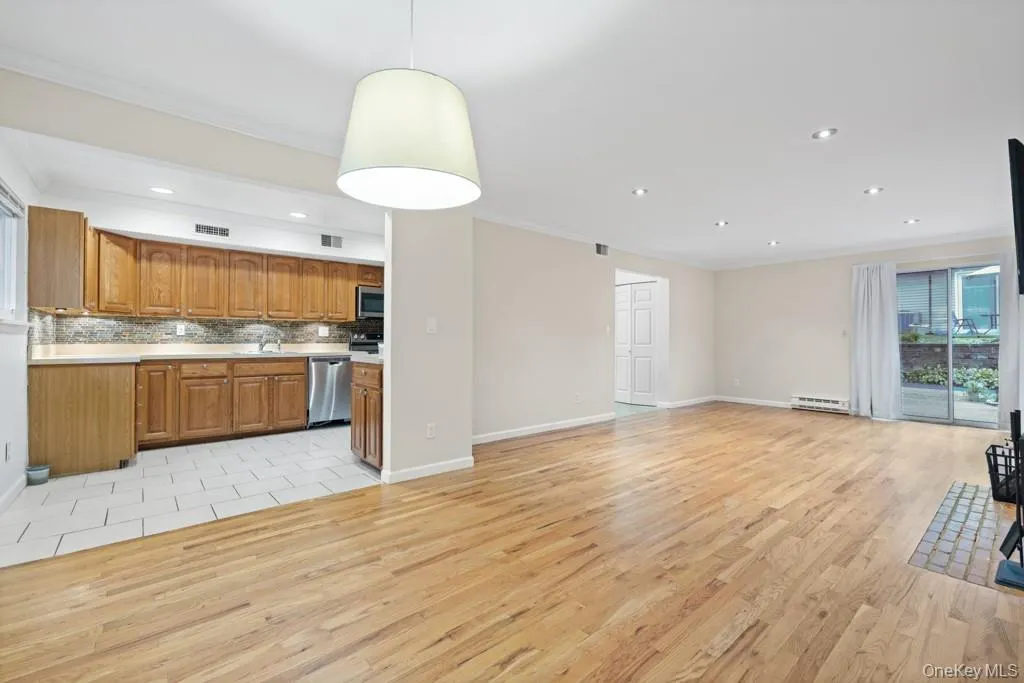 Living room opens to stylish kitchen Living room opens to stylish kitchen