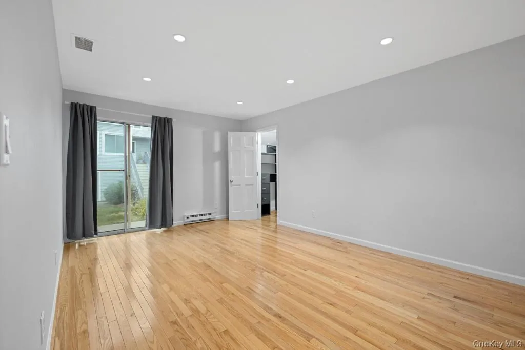 Bedroom #2 of 3, hardwood floors, large closet, slider to outside patio Bedroom #2 of 3, hardwood floors, large closet, slider to outside patio