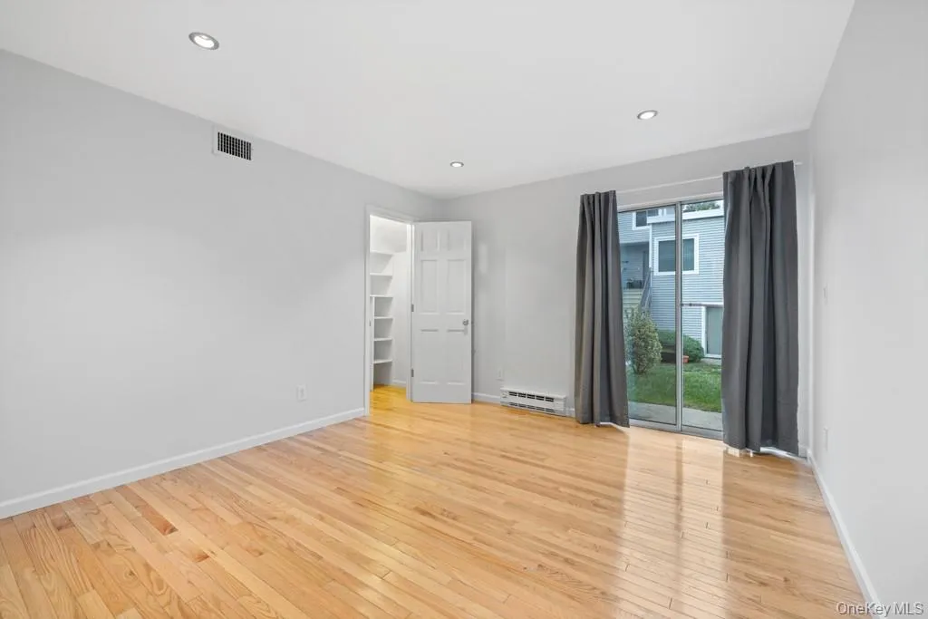 Bedroom #2 of 3, hardwood floors, large closet, slider to outside patio Bedroom #2 of 3, hardwood floors, large closet, slider to outside patio