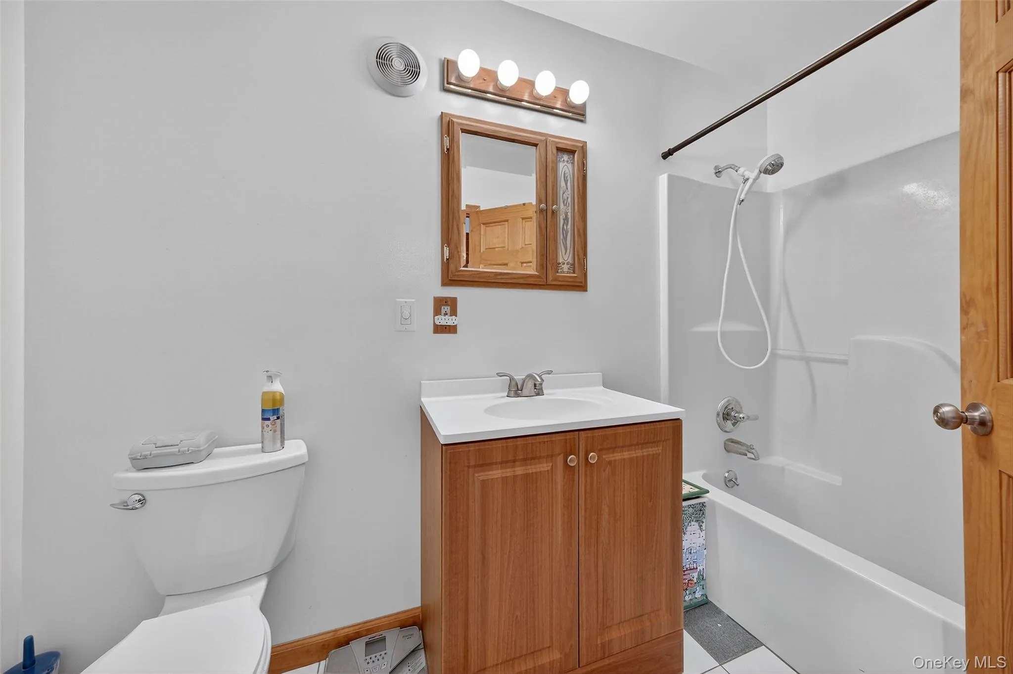 Full bath featuring bathtub / shower combination and vanity Full bath featuring bathtub / shower combination and vanity