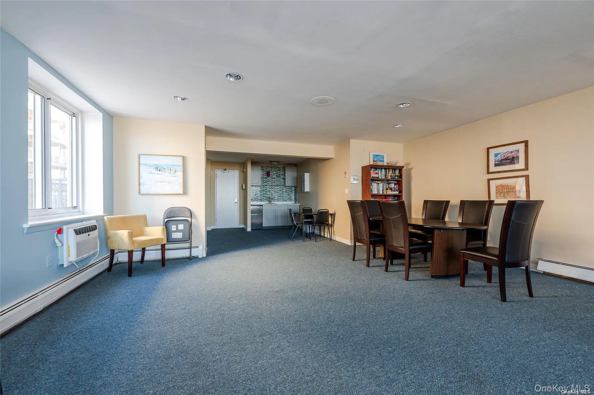Dining area featuring carpet flooring and baseboards Dining area featuring carpet flooring and baseboards