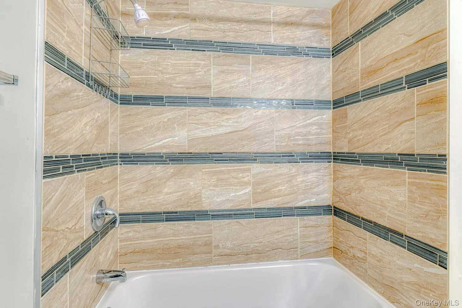 Full bathroom featuring tiled ub / shower combination Full bathroom featuring tiled ub / shower combination