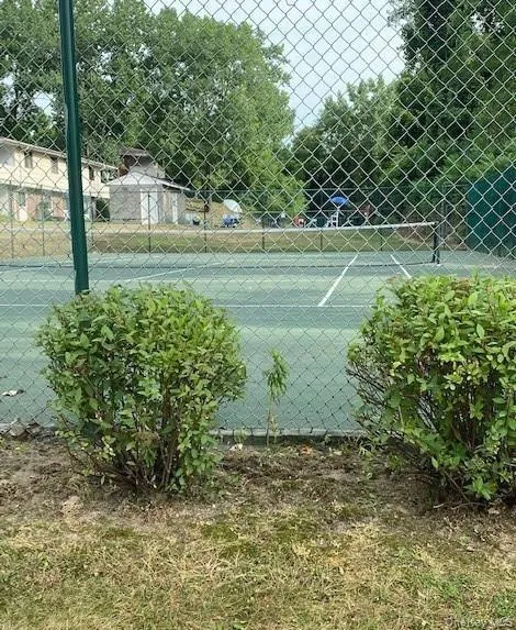 View of tennis court View of tennis court