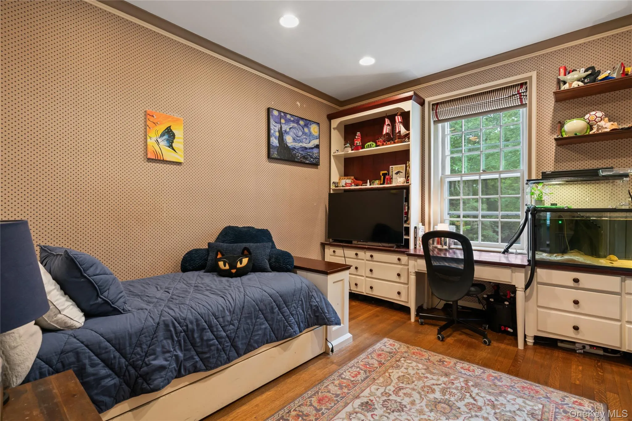 Bedroom featuring dark wood-style floors, recessed lighting, crown molding, and an office area Bedroom featuring dark wood-style floors, recessed lighting, crown molding, and an office area