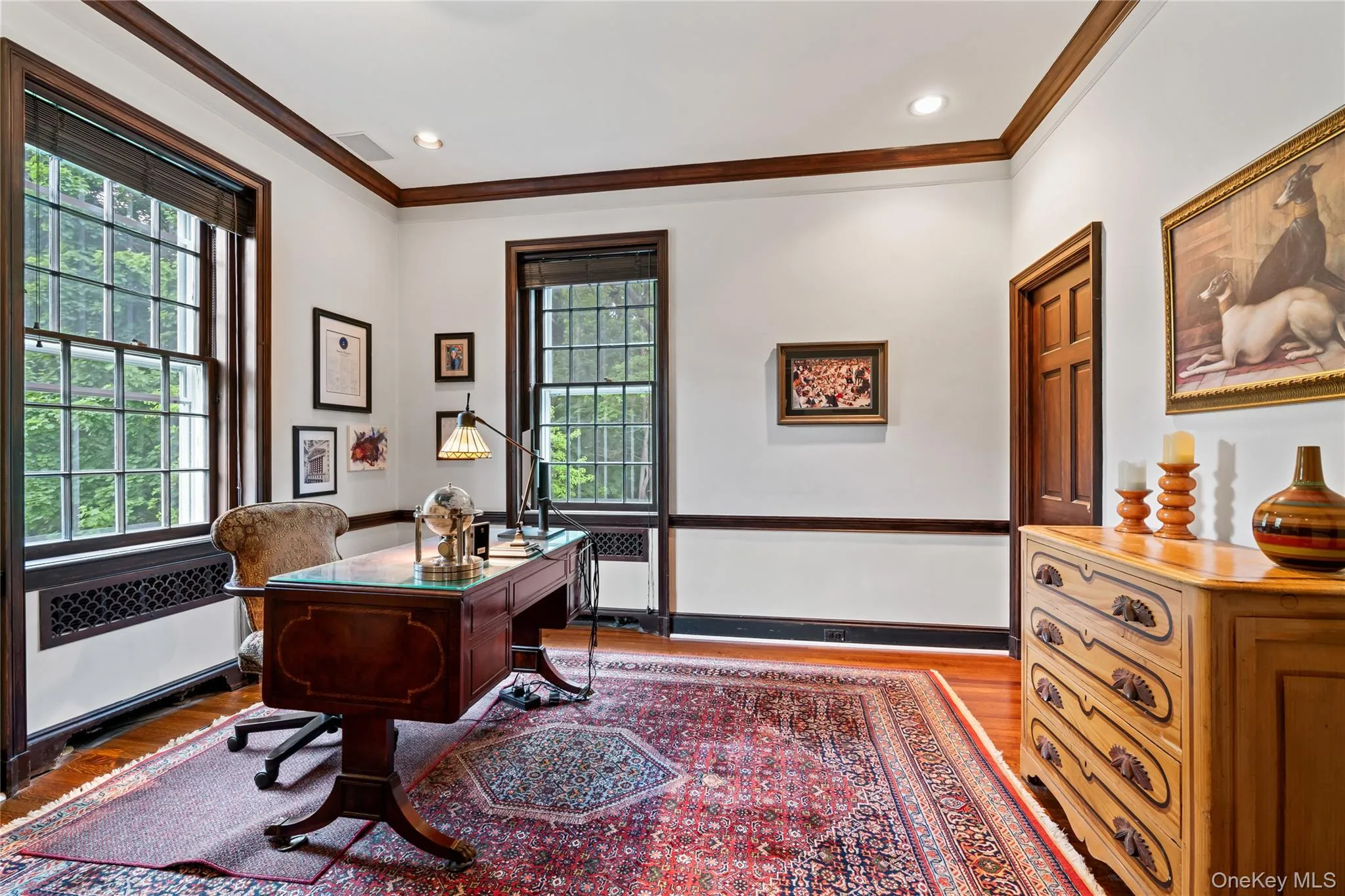 Office area with crown molding, wood finished floors, radiator, and recessed lighting Office area with crown molding, wood finished floors, radiator, and recessed lighting