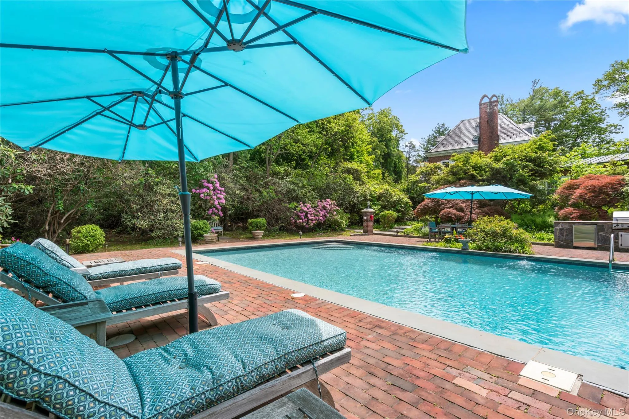 Outdoor pool featuring a patio area Outdoor pool featuring a patio area