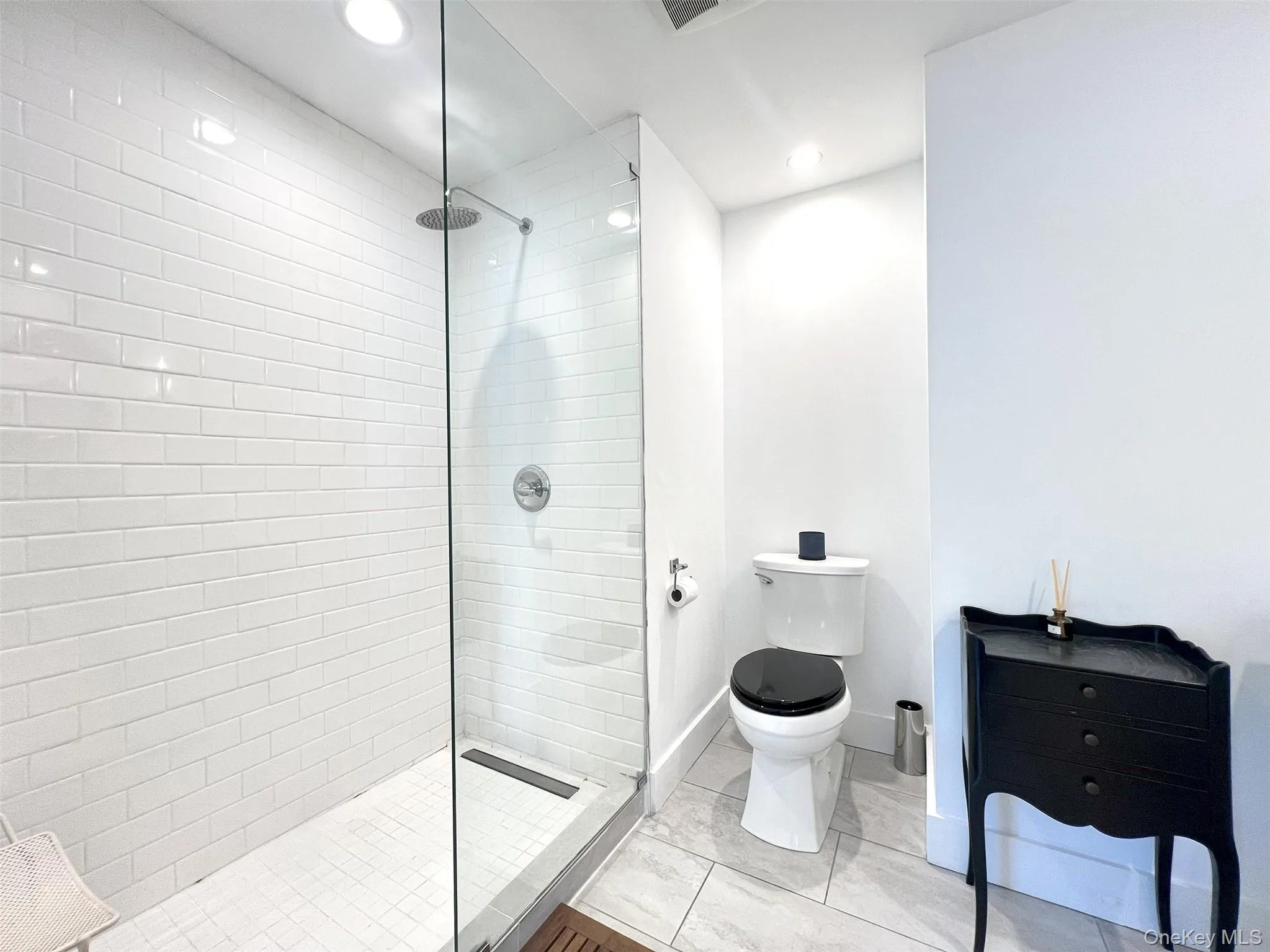 Bathroom with a tile Shower & Glass Surround Bathroom with a tile Shower & Glass Surround