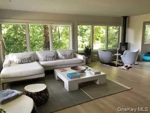 Sunroom with a wood stove Sunroom with a wood stove