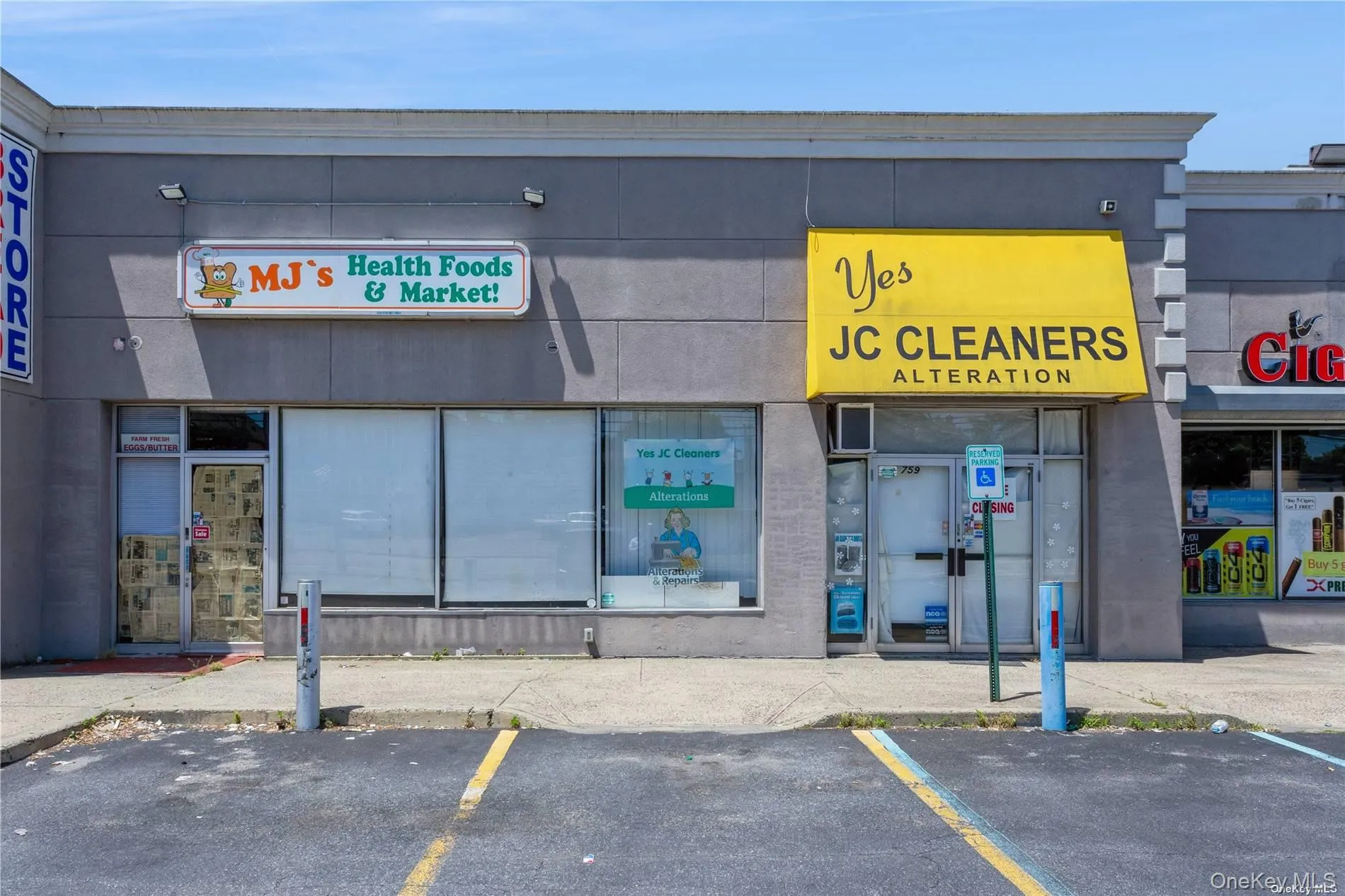 View of commercial location featuring uncovered parking View of commercial location featuring uncovered parking