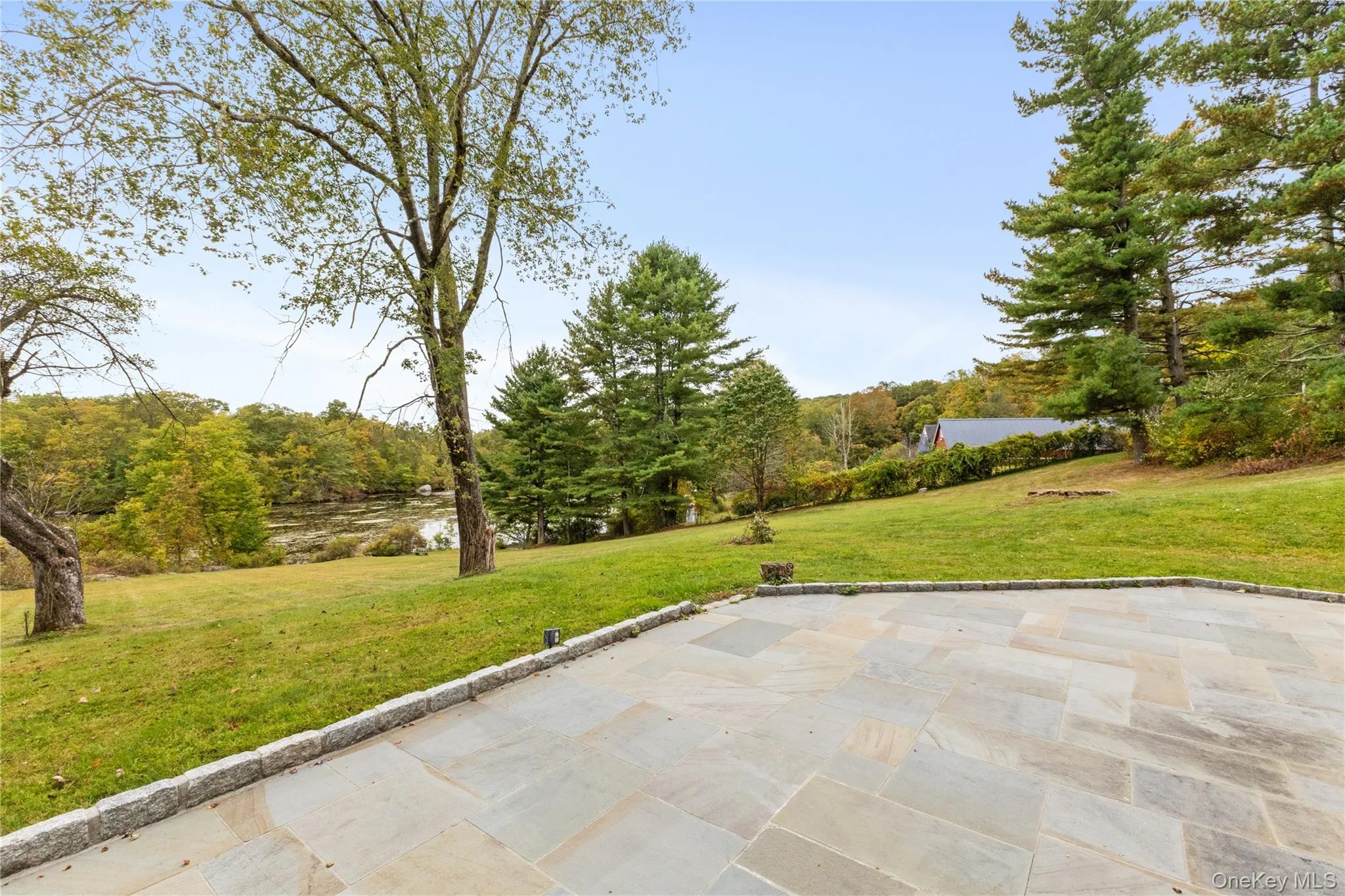 View of patio / terrace with a water view View of patio / terrace with a water view