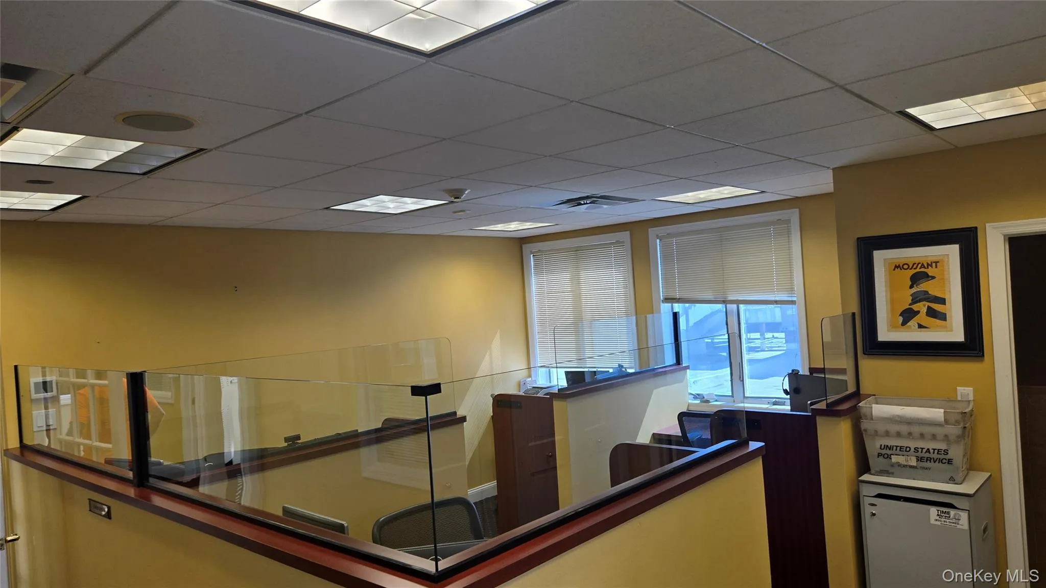 Welcome area featuring a drop ceiling Welcome area featuring a drop ceiling