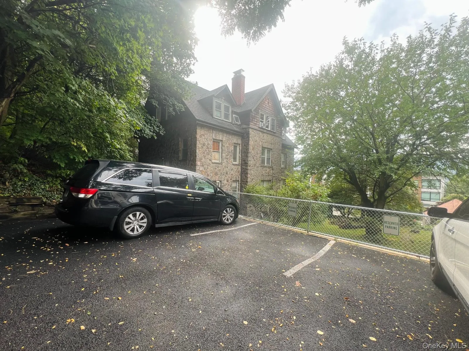 View of uncovered parking lot View of uncovered parking lot