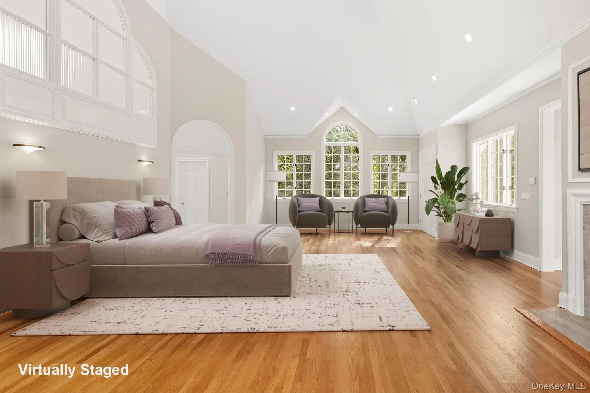 Virtually Staged - Primary bedroom with an 18 foot high cathedral ceiling and a wood burning fireplace Virtually Staged - Primary bedroom with an 18 foot high cathedral ceiling and a wood burning fireplace