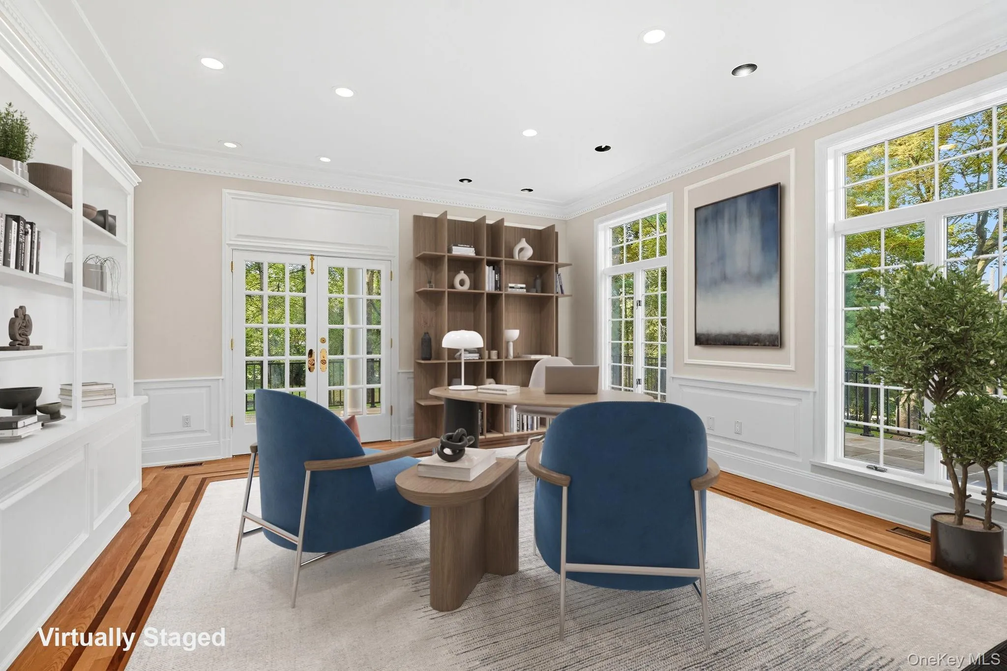Virtually Staged - Study with custom built-ins with french doors opening to a side flagstone terrace Virtually Staged - Study with custom built-ins with french doors opening to a side flagstone terrace