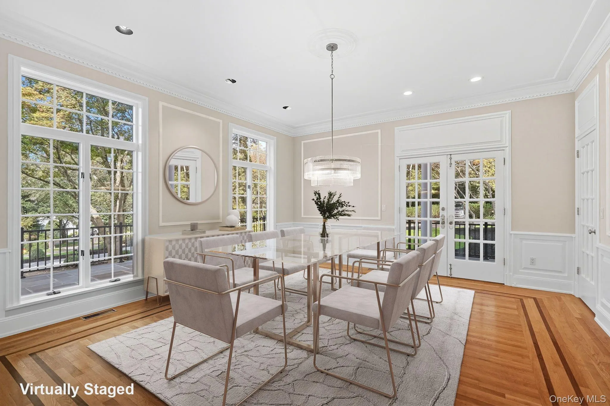 Virtually Staged - Formal dining room with french doors opening to a side flagstone terrace Virtually Staged - Formal dining room with french doors opening to a side flagstone terrace