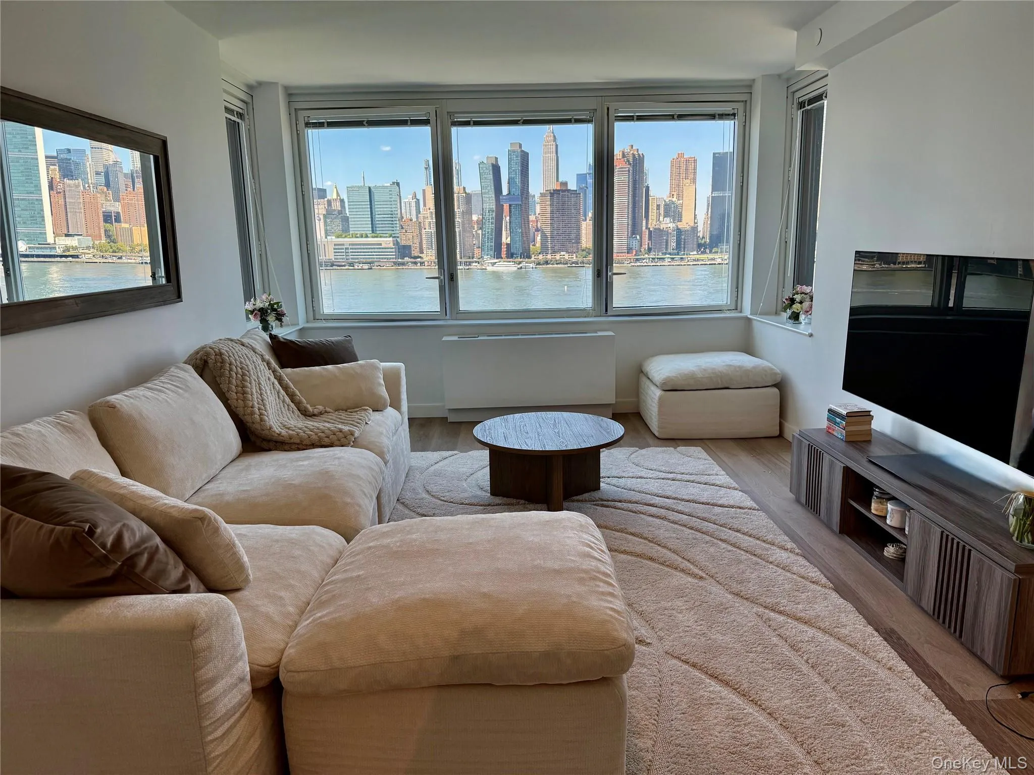 Living area featuring plenty of natural light Living area featuring plenty of natural light