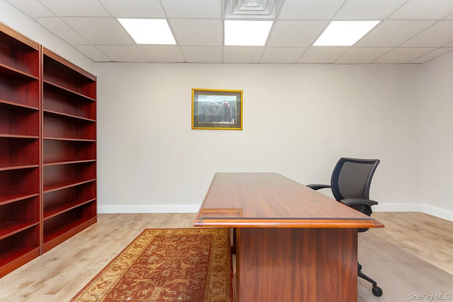 (Digitally Decluttered) Home office with a drop ceiling and light wood-style floors (Digitally Decluttered) Home office with a drop ceiling and light wood-style floors