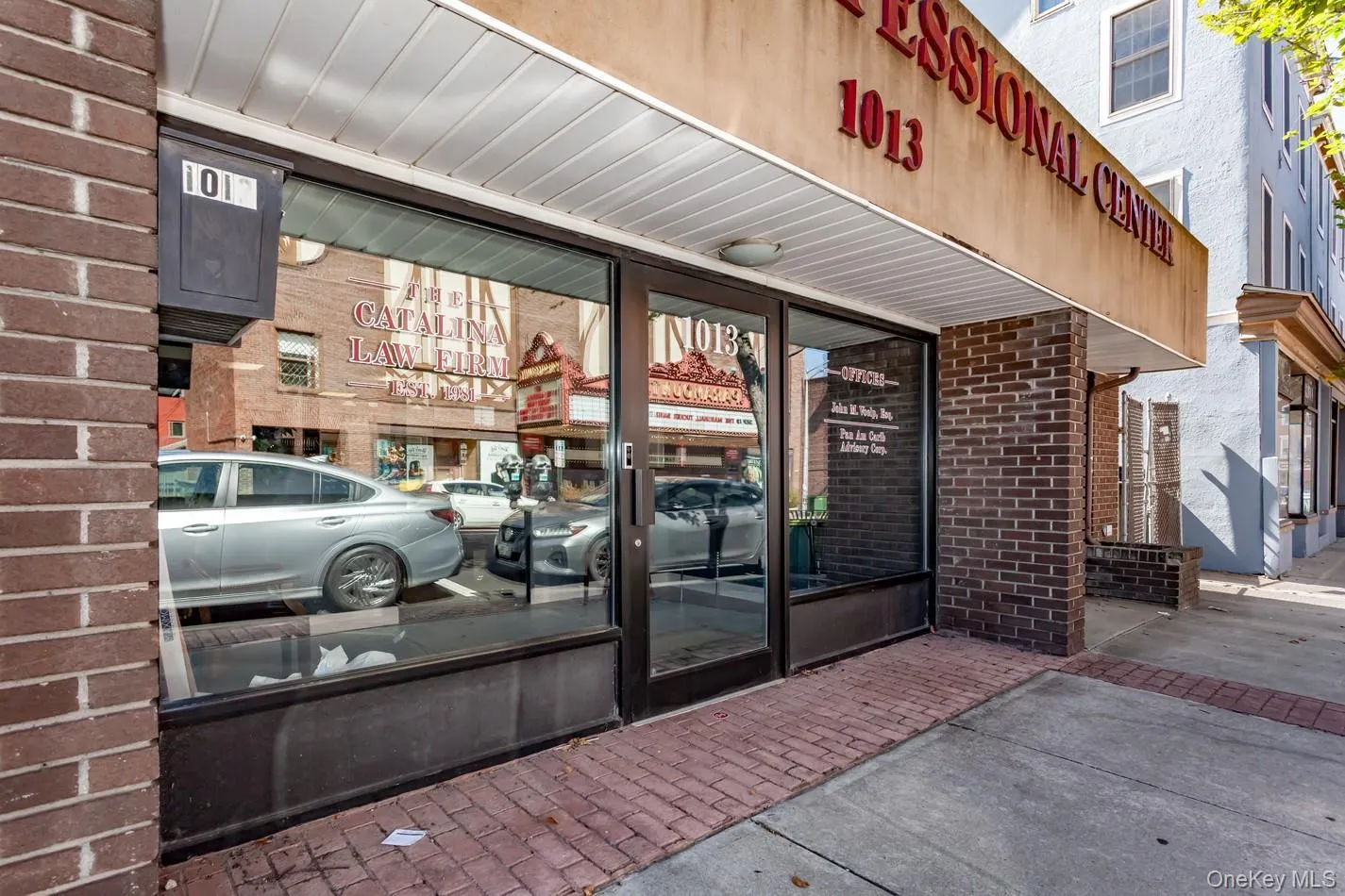 Doorway to property with brick siding Doorway to property with brick siding