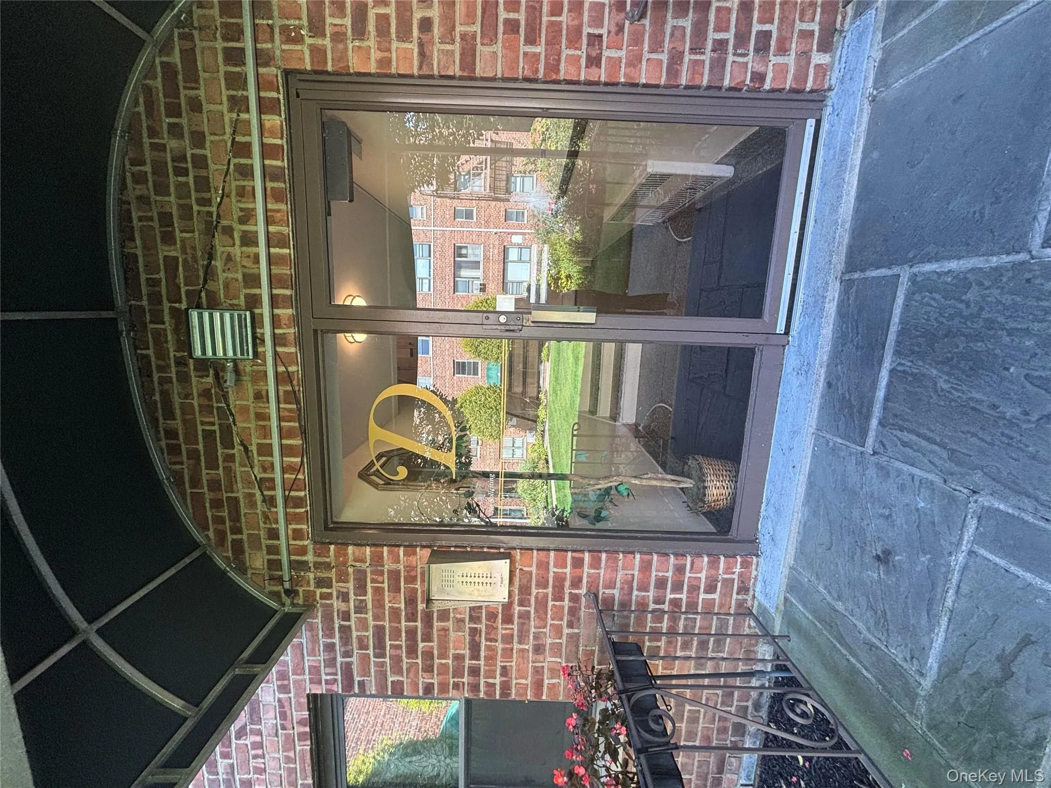 Entrance to property featuring brick siding Entrance to property featuring brick siding