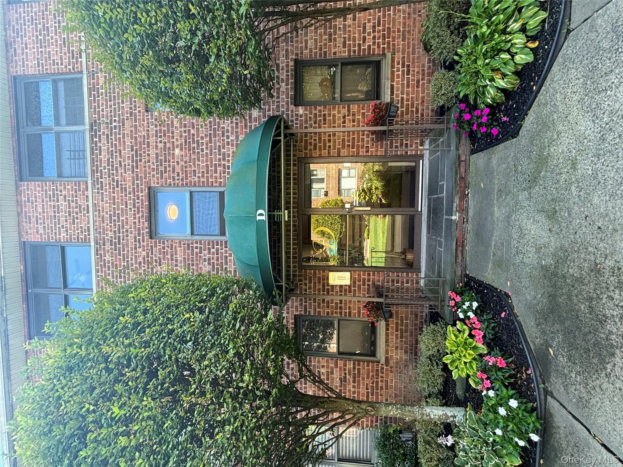 Entrance to property with brick siding Entrance to property with brick siding