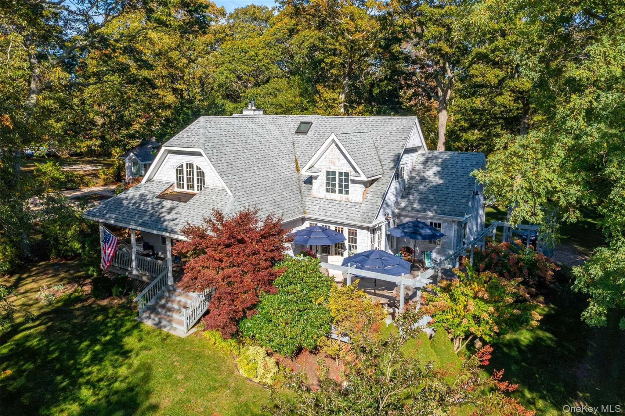 View from above of property featuring a tree filled landscape View from above of property featuring a tree filled landscape
