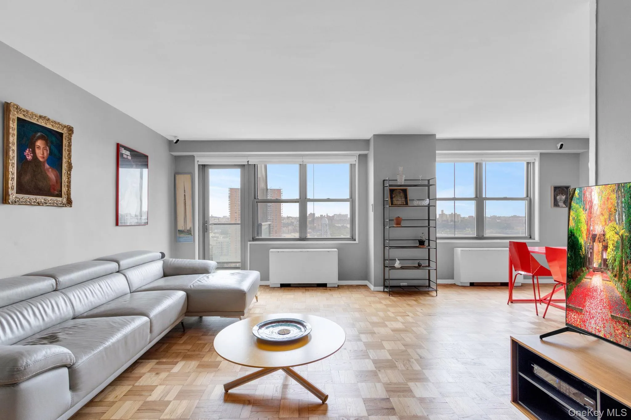 Living area featuring baseboards Living area featuring baseboards