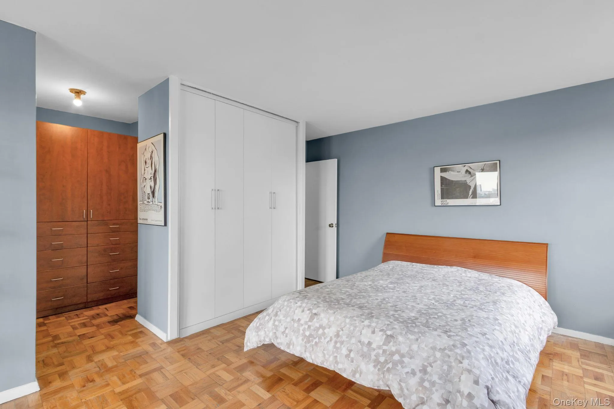 Bedroom featuring a closet and baseboards Bedroom featuring a closet and baseboards