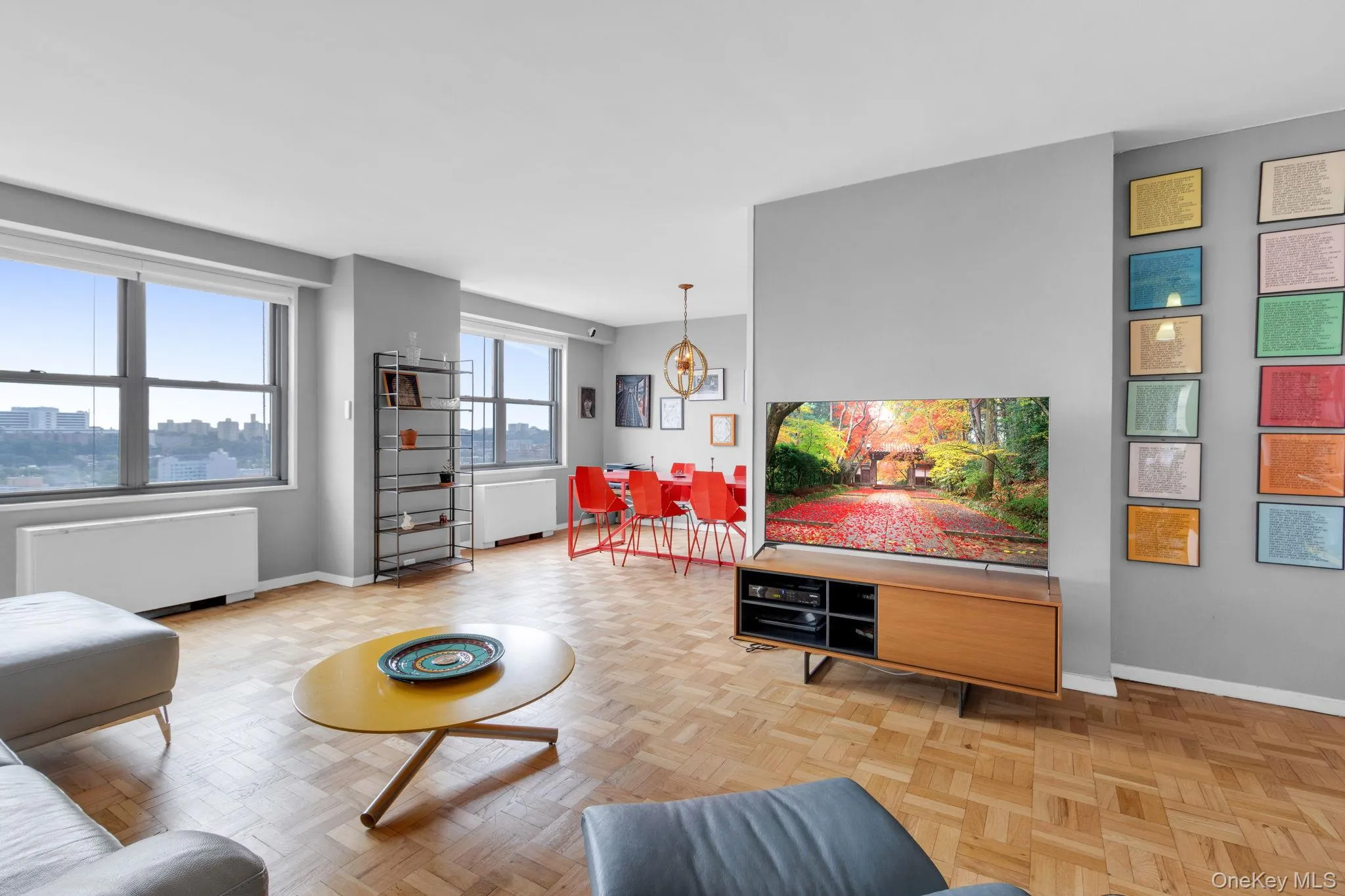 Living area with radiator and a view of city Living area with radiator and a view of city