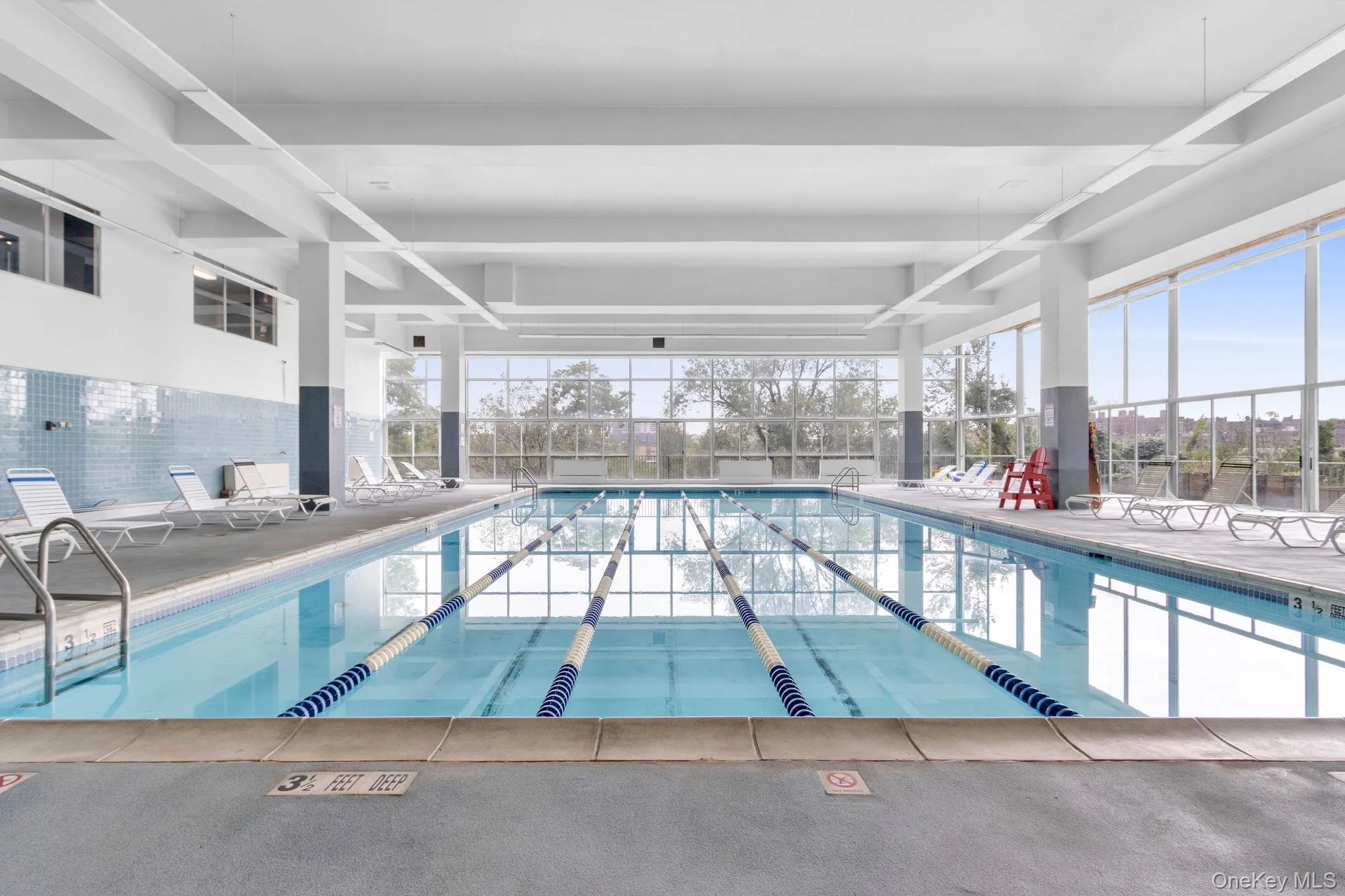 Indoor pool with a patio Indoor pool with a patio