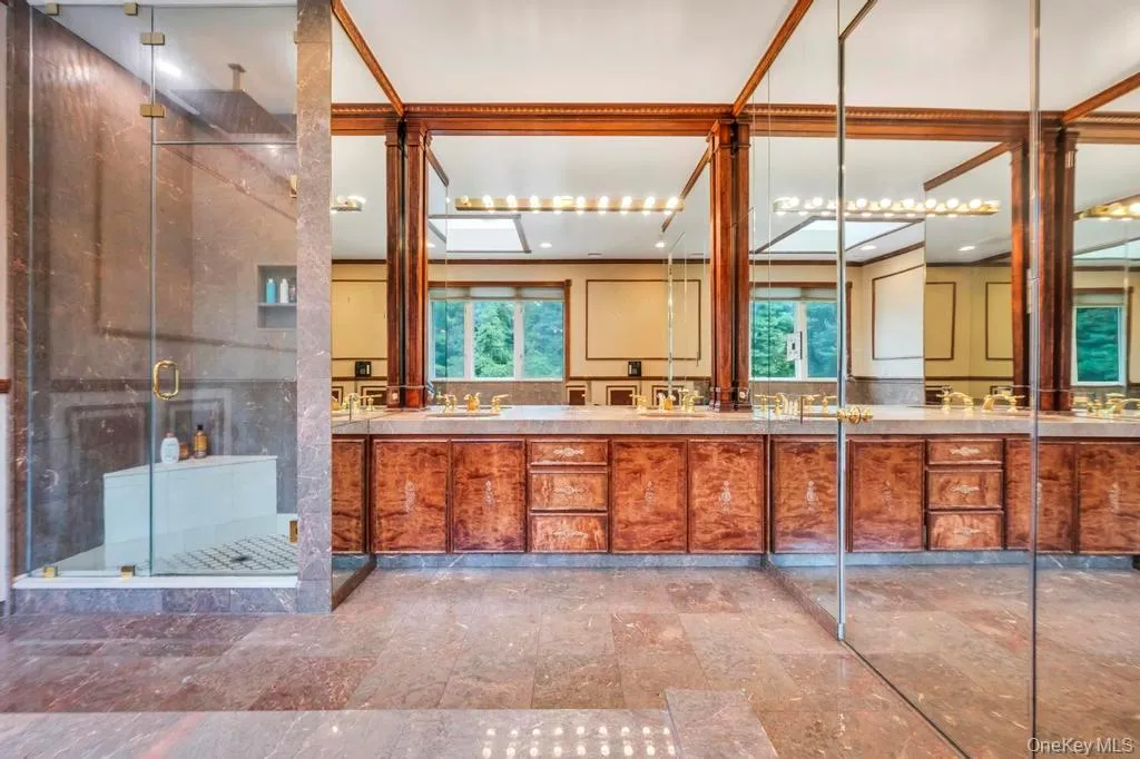 Bathroom with a stall shower and double vanity Bathroom with a stall shower and double vanity