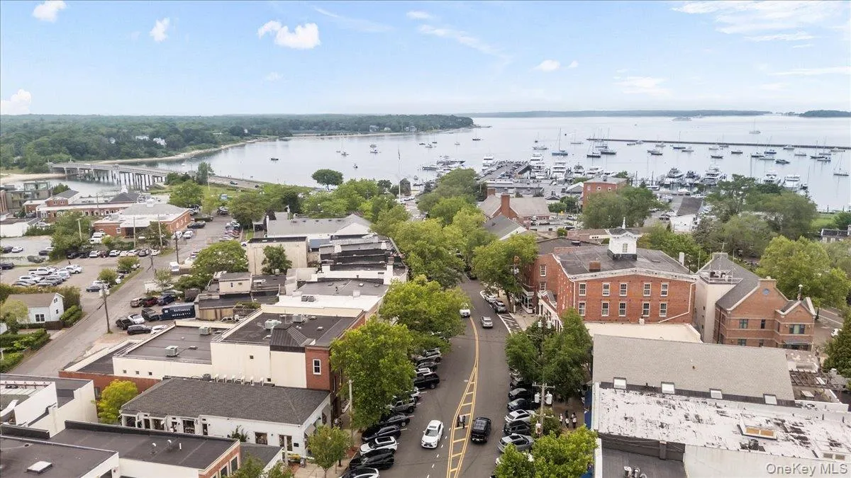 Aerial view of a large body of water and numerous boat docks Aerial view of a large body of water and numerous boat docks