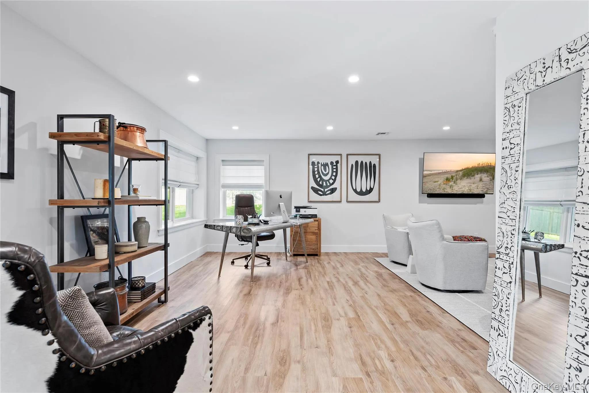 Office featuring light wood-style floors and recessed lighting