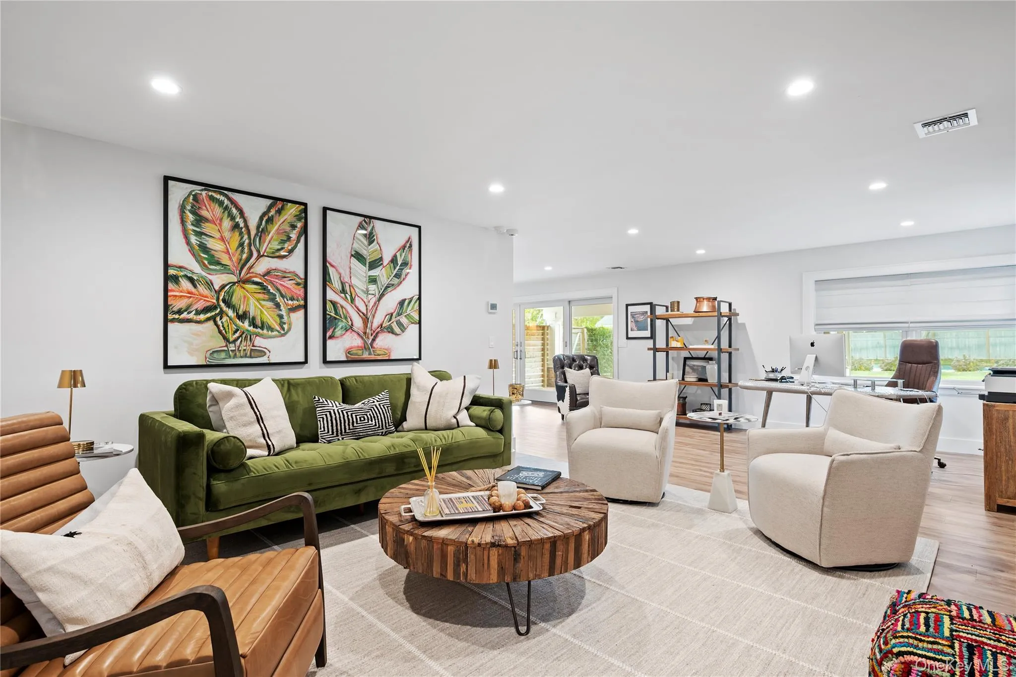 Living room with recessed lighting and wood finished floors