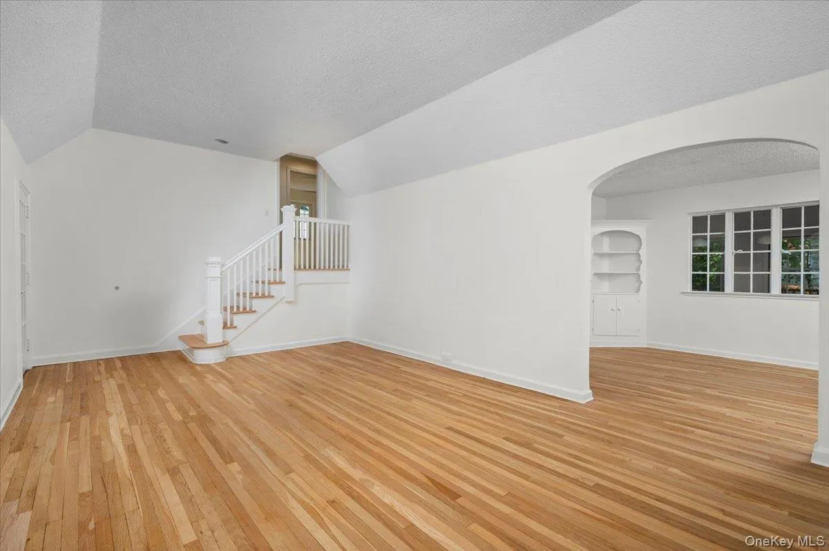 The living room opens into the dining room. The living room opens into the dining room.