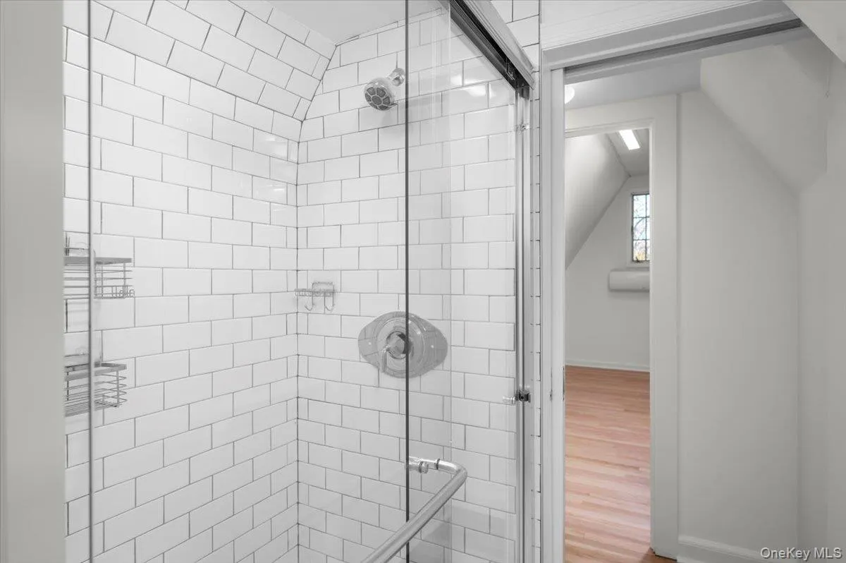 Shower located within bathroom on top level. Shower located within bathroom on top level.