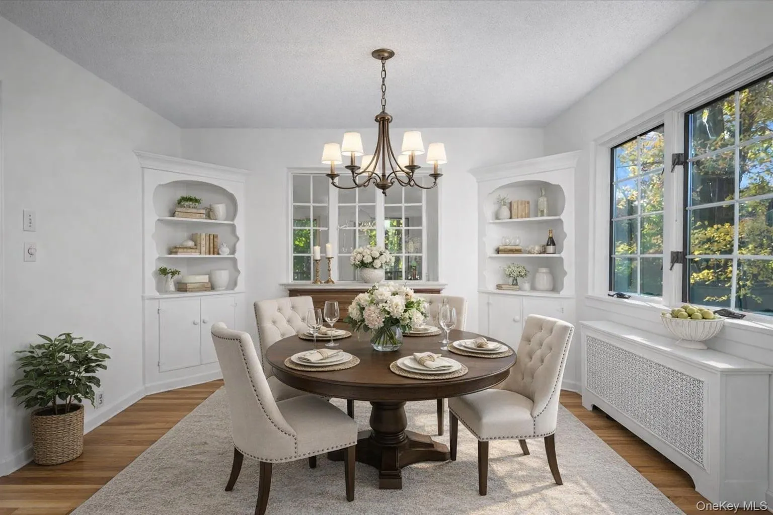 Virtually staged dining room. Virtually staged dining room.