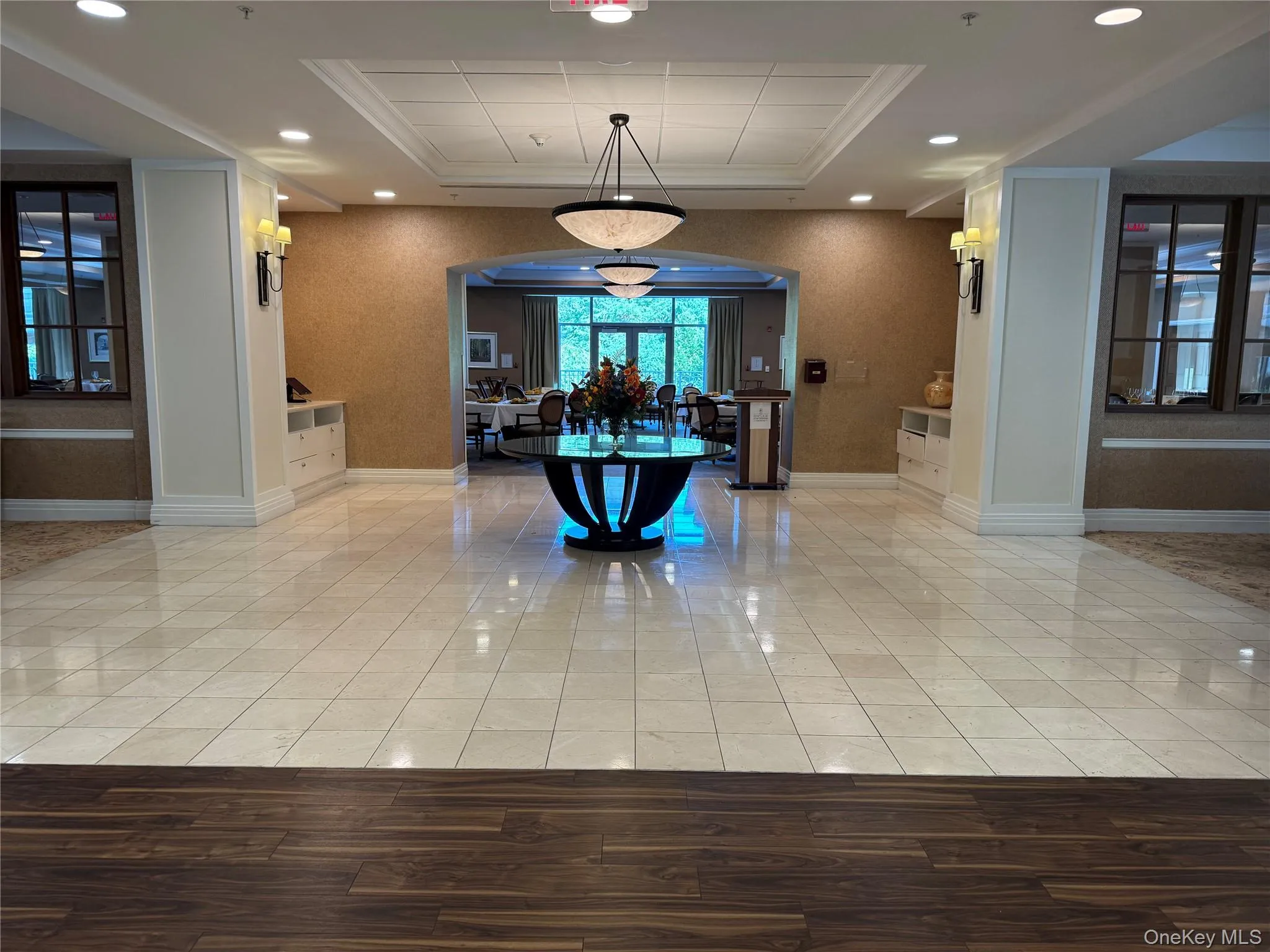 Common area featuring recessed lighting and crown molding Common area featuring recessed lighting and crown molding
