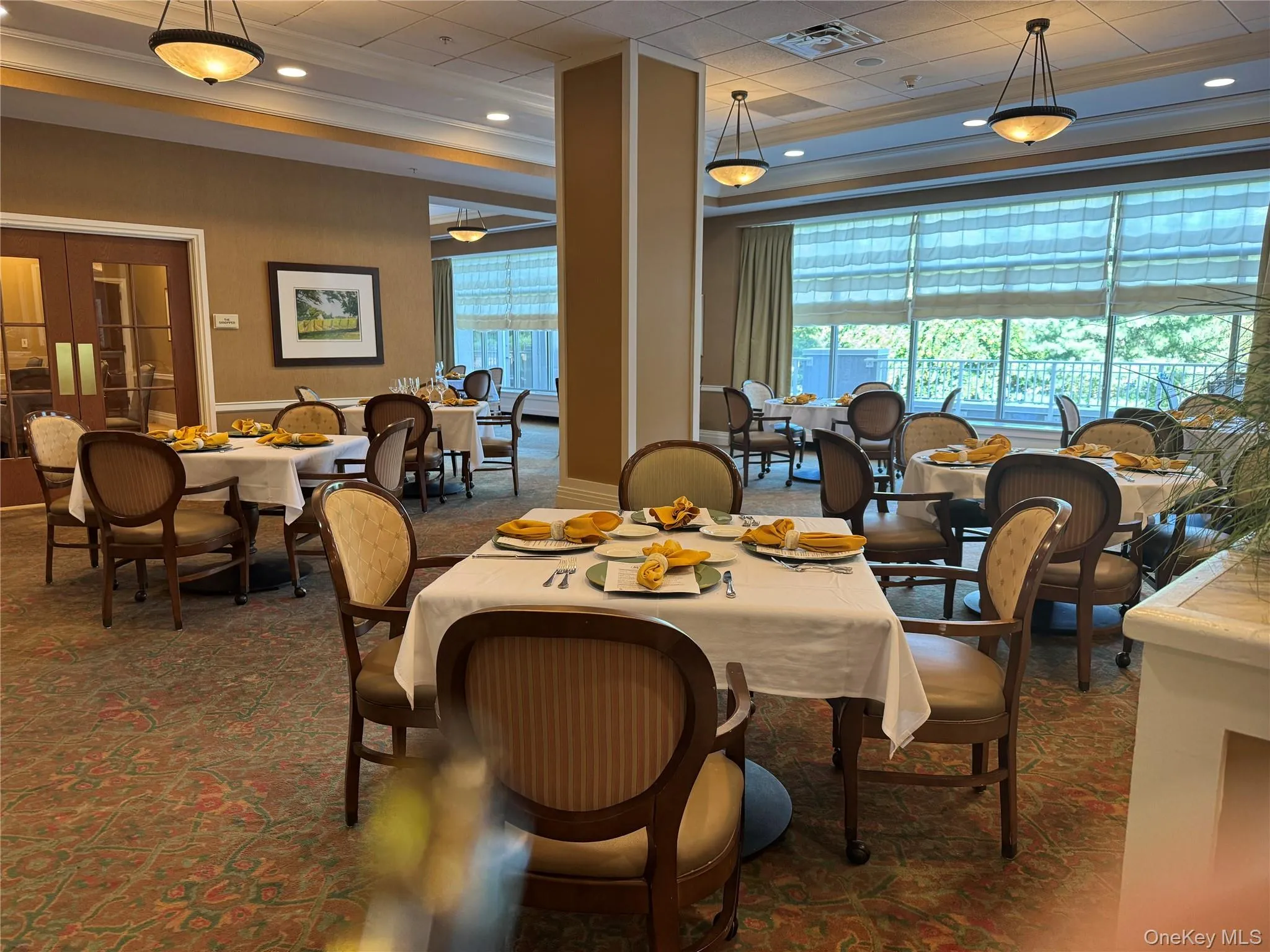Dining room with ornamental molding and recessed lighting Dining room with ornamental molding and recessed lighting