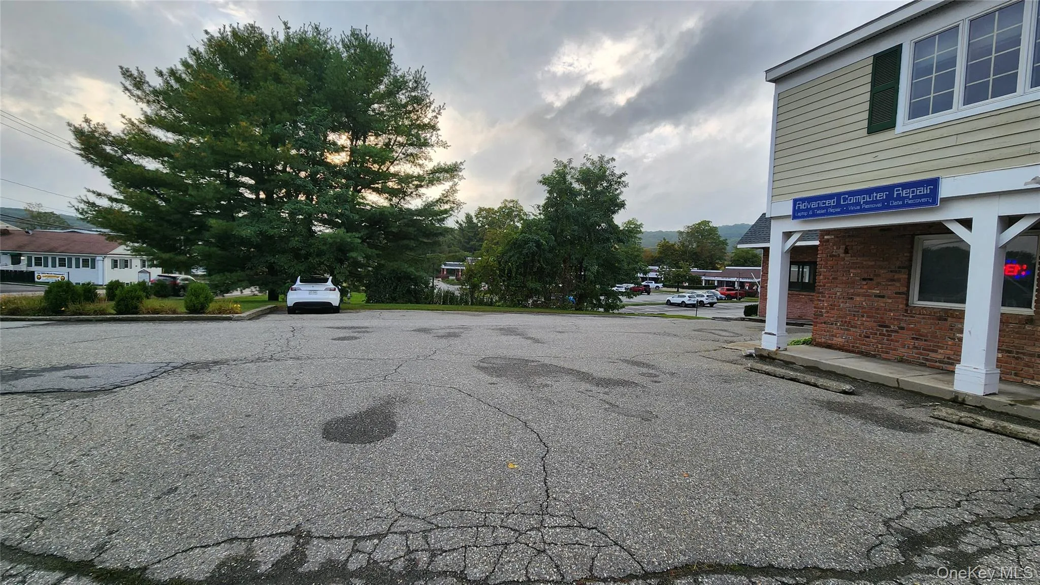 View of street featuring curbs View of street featuring curbs
