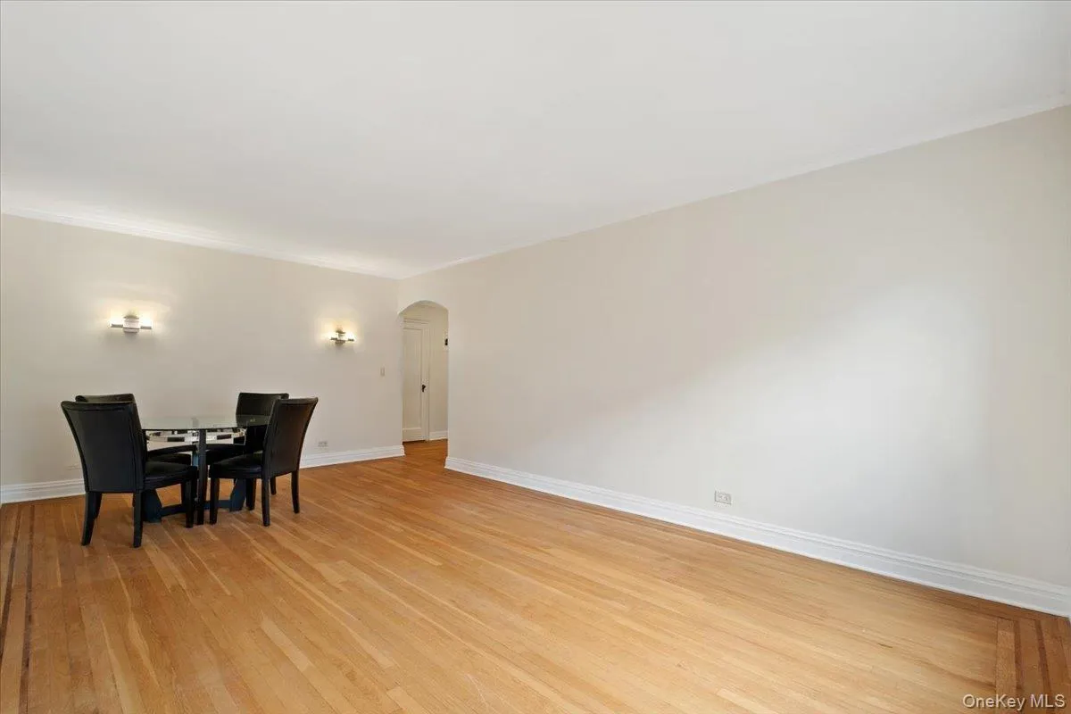 Living room with an arched doorway Living room with an arched doorway