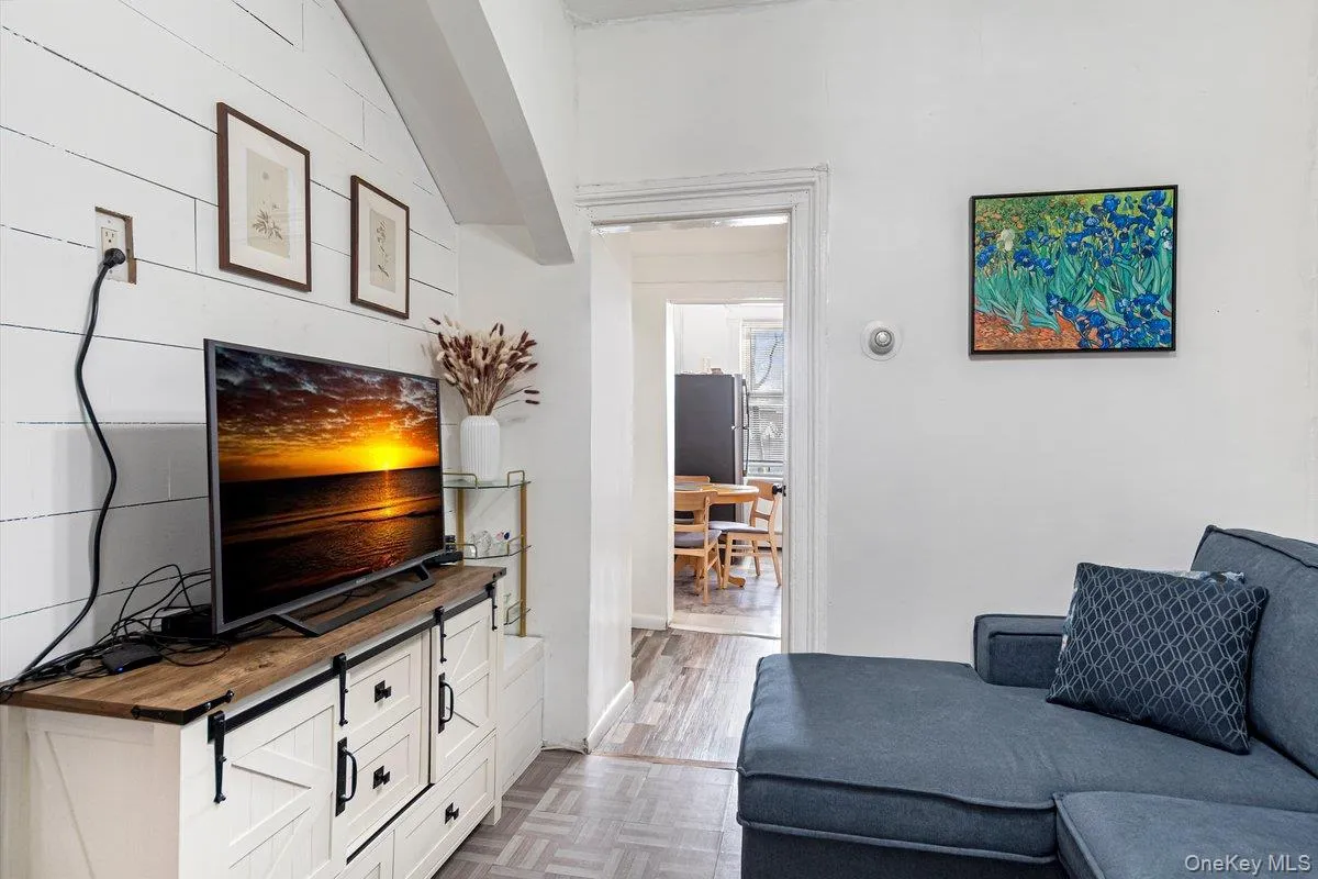 Living area featuring parquet floors Living area featuring parquet floors